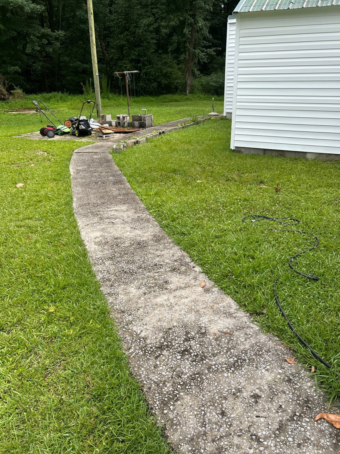 Walkway leading to a back deck