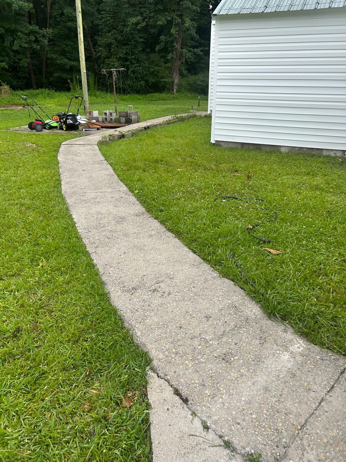 Vinyl siding with a deck at the back of a house